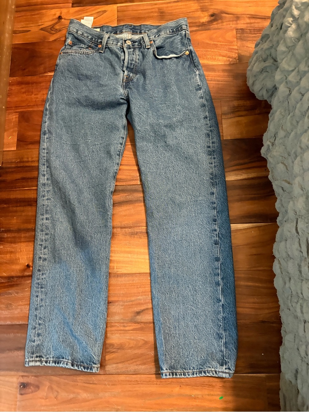 Levi’s Premium 501 ’90s jeans in a classic medium-blue wash. (1500)